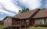Portfolio 1" Foamback Cedar Grain Vinyl Panel 5"width, Rust Red Window Trim, no nails exposed